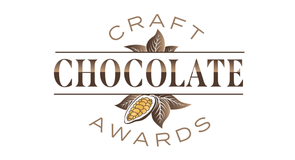 the Craft Chocolate Awards logo. The top has a curving golden brown "CRAFT", a larger "CHOCOLATE" in the middle surrounded by cacao leaves and pods, and a curving "AWARDS" at the bottom.